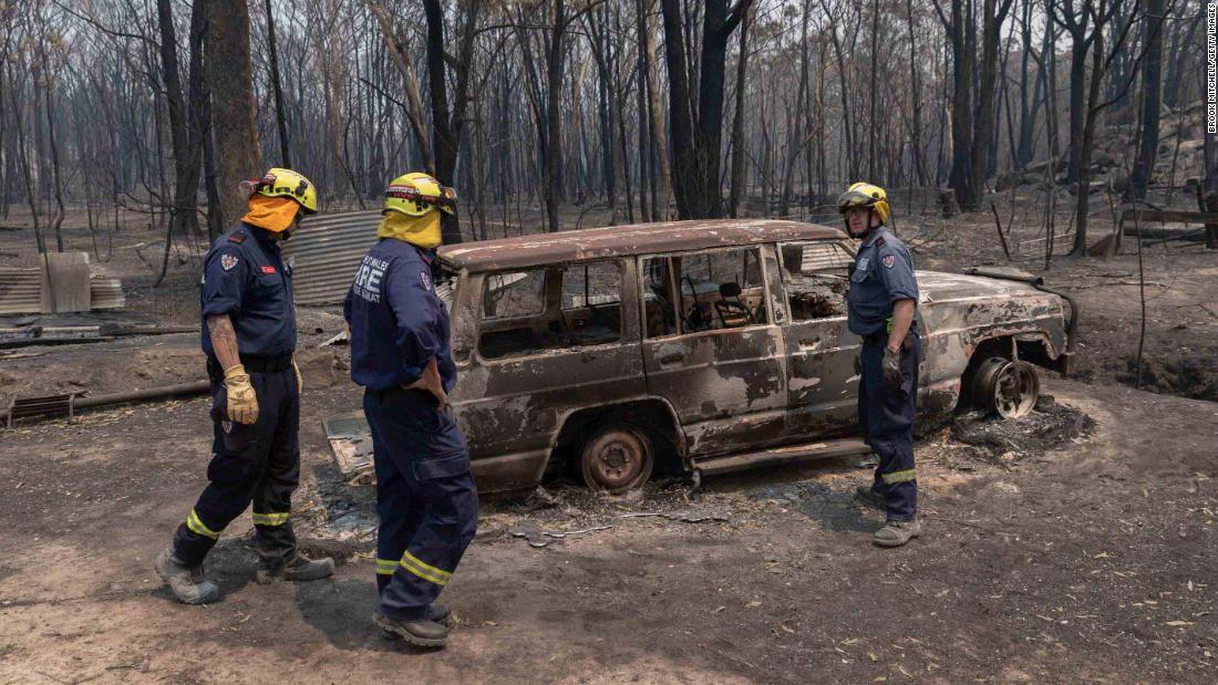 A fire and rescue team inspects damage around the village of Torrington on November 11.