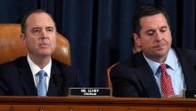 House Intelligence Committee Chairman Adam Schiff of Calif., left, speaks as Rep. Devin Nunes, R-Calif., the ranking member on the committee, listens during the House Intelligence Committee on Capitol Hill in Washington, Wednesday, Nov. 13, 2019.