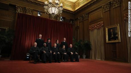 U.S. Supreme Court Justices pose for their official portrait at the in the East Conference Room at the Supreme Court building November 30, 2018 in Washington, DC.