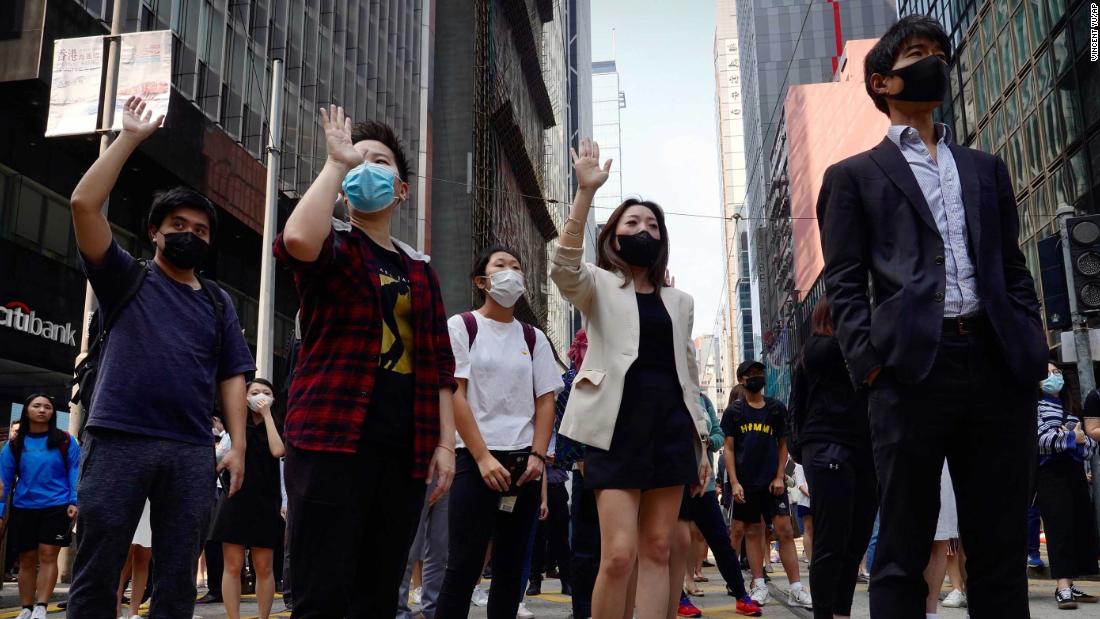 Demonstrators gather during a lunchtime protest in the financial district of Hong Kong on November 14.