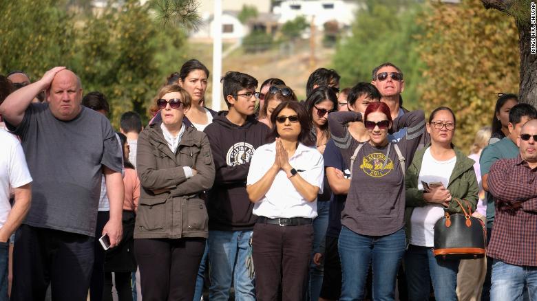 Parents wait to reunite with their children after the  shooting at Saugus High School in Santa Clarita, California. 