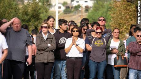 Parents wait to reunite with their children after the  shooting at Saugus High School in Santa Clarita, California. 