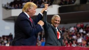 President Donald Trump stands with Louisiana Republican gubernatorial candidate Eddie Rispone during a campaign rally at the CenturyLink Center, Thursday, November 14, 2019, in Bossier City, Louisiana.