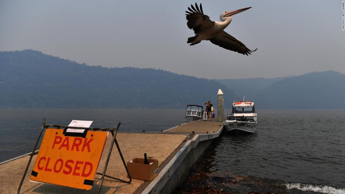 Bushfire smoke clouds the sky over the Hawkesbury River in Brooklyn, Australia.