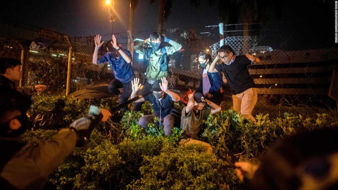 Police detain a group of people after they tried to flee the Hong Kong Polytechnic University campus on November 19. Last week, thousands of student protesters streamed into the &lt;a href=&quot;https://www.cnn.com/2019/11/19/asia/hong-kong-polytechnic-university-scene-intl-hnk/index.html&quot; target=&quot;_blank&quot;&gt;university and occupied the campus &lt;/a&gt;as the city's violent political unrest reached fever pitch.