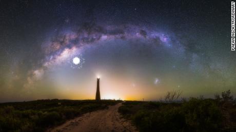 This photomosaic of 28 images shows the Milky Way arching over the Guilderton Lighthouse in Western Australia.