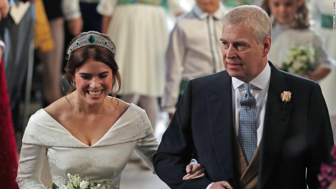 Princess Eugenie is accompanied by her father during her wedding in 2018.