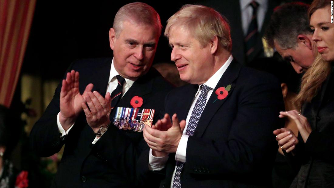 Prince Andrew talks with British Prime Minister Boris Johnson at the annual Royal British Legion Festival of Remembrance, which took place in London in November 2019.