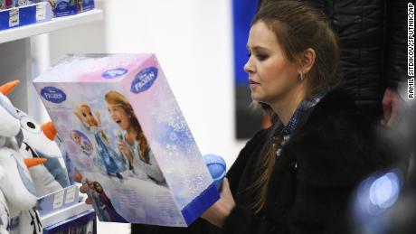 A customer examines a &quot;Frozen 2&quot; toy at a Disney brand toy shop, which was opened at the Central Children&#39;s Store on Lubyanka street in Moscow.