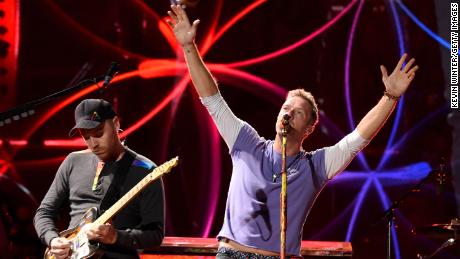 Chris Martin has revealed that Coldplay has put touring plans on hold for environmental reasons.