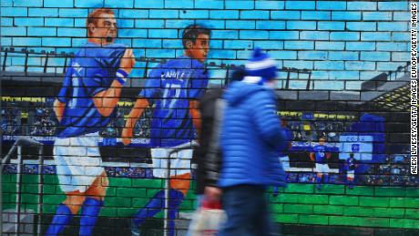  Fans walk past an Everton mural prior to the Premier League match between Everton FC and AFC Bournemouth at Goodison Park on January 13, 2019.