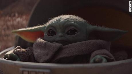 Baby Yoda, killing us with cuteness. 