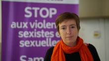 Co-founder Caroline de Haas stands in front of a poster for the group Nous Toutes, who are helping organize large scale protests about femicide and domestic violence around France.