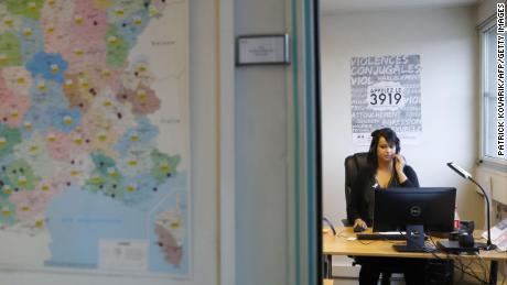 An employee of the French Fédération Nationale Solidarité Femmes (National Federation for women's solidarity) takes calls of the French national domestic sexual violence against women hotline 3919, in Paris in 2016.