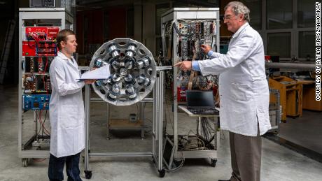 Physicist Attila Krasznahorkay, right, works with a fellow researcher at the Institute for Nuclear Research at the Hungarian Academy of Sciences.