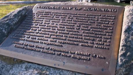 A plaque on Cole's Hill in Massachusetts recognizes the counter-commemoration on Thanksgiving.