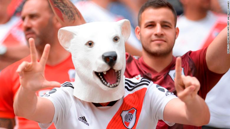 Fans of Argentina&#39;s team River Plate cheer before the start of the Copa Libertadores final.