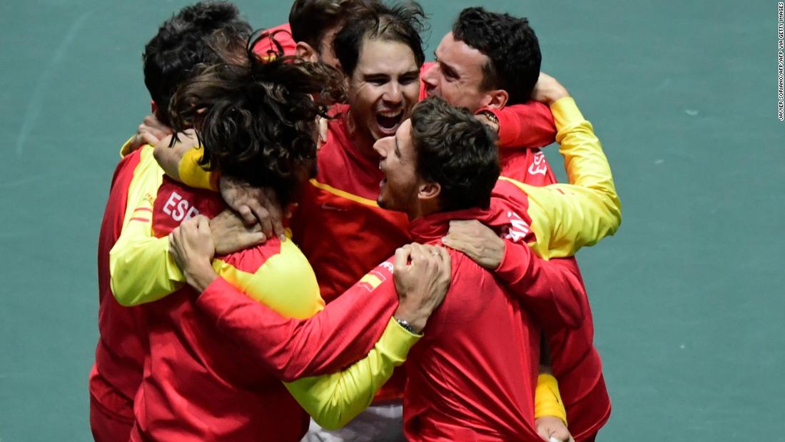 Spain&#39;s Rafa Nadal celebrates with teammates after winning against Canada&#39;s Denis Shapovalov in the Davis Cup.