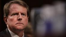 White House Counsel Don McGahn looks on as Judge Brett Kavanaugh appears before the Senate Judiciary Committee during his Supreme Court confirmation hearing in the Hart Senate Office Building on Capitol Hill September 4, 2018 in Washington, DC.