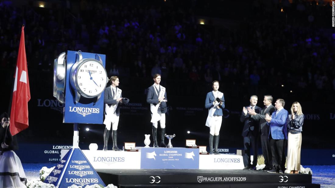 To cap a stellar season, Briton Ben Maher (center) adds the Super Grand Prix crown to his second straight Longines Global Champions Tour title.