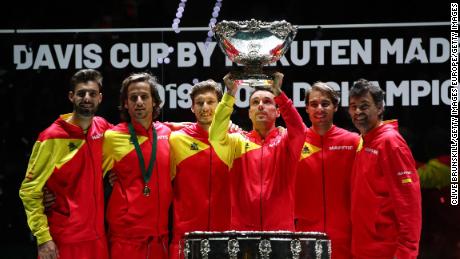 Roberto Bautista Agut lifts the trophy as Spain celebrate beating Canada in this year&#39;s Davis Cup. It is the sixth time they have won the title. 