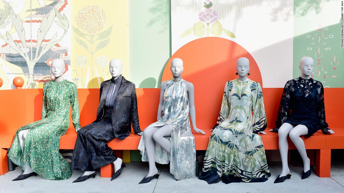 H&amp;M displays dresses from its 2018 Conscious Exclusive collection. The retailer wants to be seen as a climate champion — but that sustainability mission is in direct tension with its fast fashion business model. (Stefanie Keenan/Getty Images for H&amp;M)