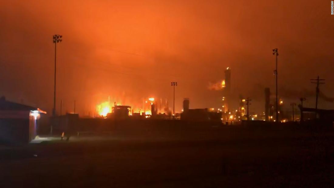 Hours after explosions rocked a Texas chemical plant, a fire continues
