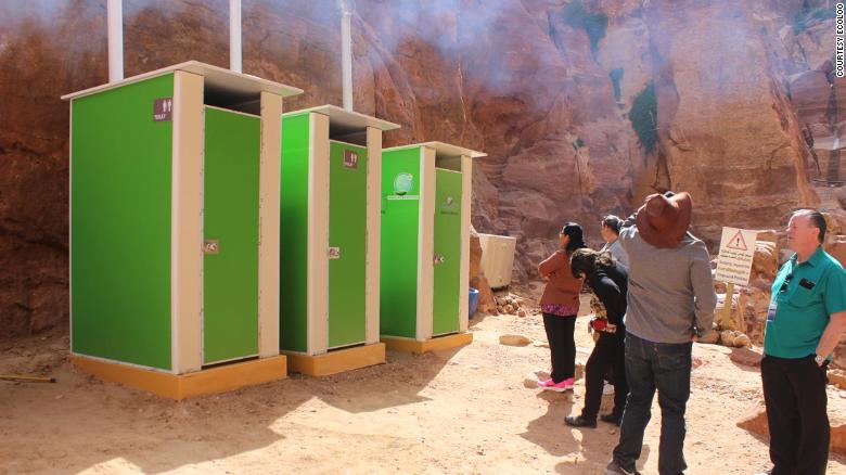 Tourists queue outside EcoLoo cubicles at Petra, Jordan. The UNESCO World Heritage acquired the units in 2016, with local media reporting that fertilizer produced by the toilets was used in plant nurseries. 
