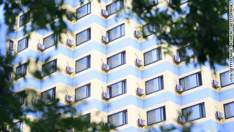 SHENYANG, CHINA - JULY 18: Air conditioning units hang off the back side of a row of buildings on July 18, 2018 in Shenyang, Liaoning Province of China. Some Chinese people spend sanfu, the hottest day of the year, in air-conditioned buildings. Chinese people embraced the second day of Sanfu - the dog days of the summer, on Wednesday. (Photo by VCG)