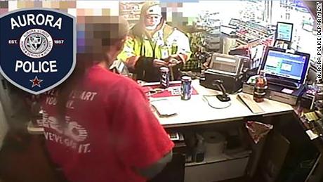 Footage from the gas station showing Michelle Passley purchasing beer.