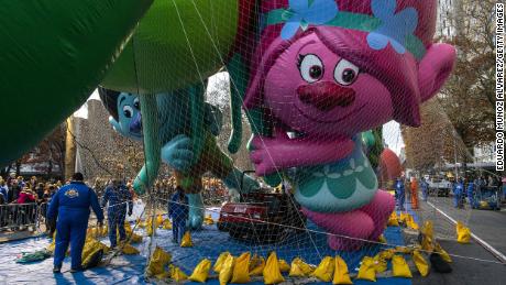 The Trolls balloon is kept under a net during Wednesday&#39;s inflation process in New York.