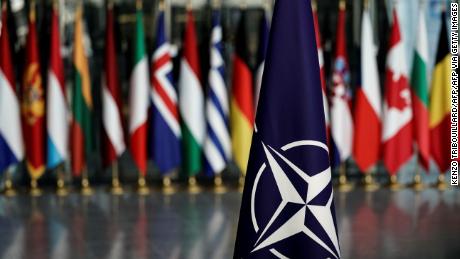 November 20, 2019 shows a NATO flag at the NATO headquarters in Brussels (Photo by KENZO TRIBOUILLARD/AFP via Getty Images)