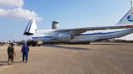 This image, shared widely on social media and verified by a CNN source, appear to show a Russian Antonov 124 transport plane  arriving in September at Nacala on Mozambique&#39;s eastern coast delivering military hardware.