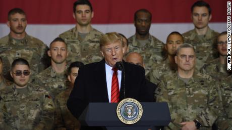 US President Donald Trump speaks to the troops during a surprise Thanksgiving day visit at Bagram Air Field, on November 28, 2019 in Afghanistan. 