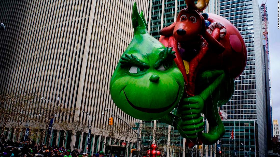 The Grinch balloon looks as mischievous as ever.