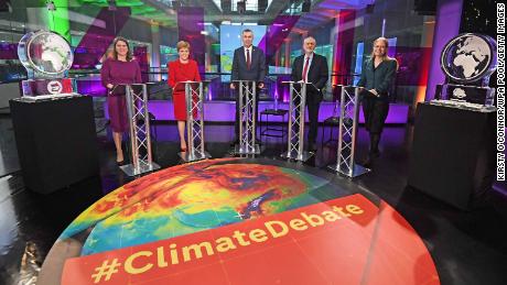 Party leaders stand next to ice sculptures representing the Brexit Party and Conservative Party at Channel 4 News&#39; General Election climate debate in November.