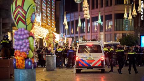 Police say multiple people were wounded as crowds of shoppers packed the stores on Grote Marktstraat.