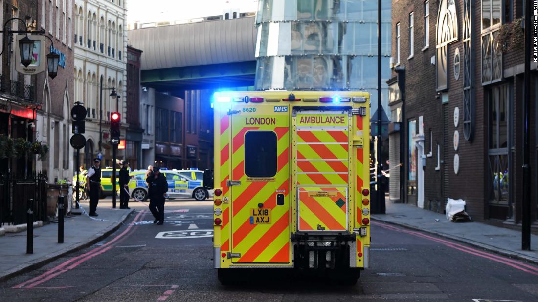  An ambulance makes its way to the scene of the attack.