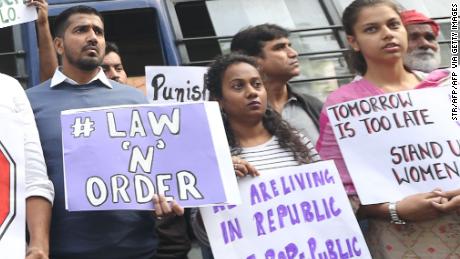 Protesters in New Delhi hold a demonstration on Friday demanding justice after the rape and murder case of the veterinarian in Hyderabad.