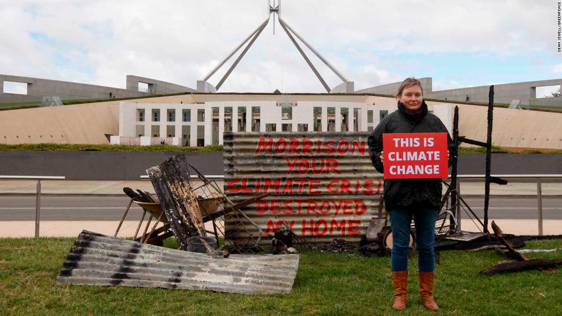 Woman dumps remains of her bushfire-ravaged home outside Australian parliament to protest climate change - CNN