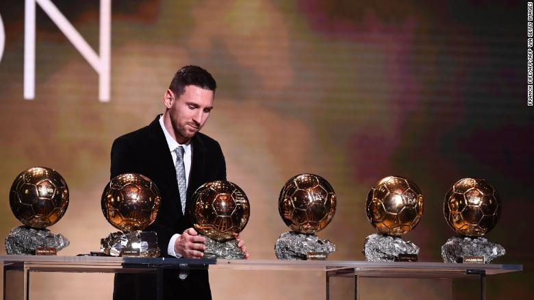 Barcelona&#39;s Lionel Messi reacts after winning his sxith Ballon d&#39;Or award.