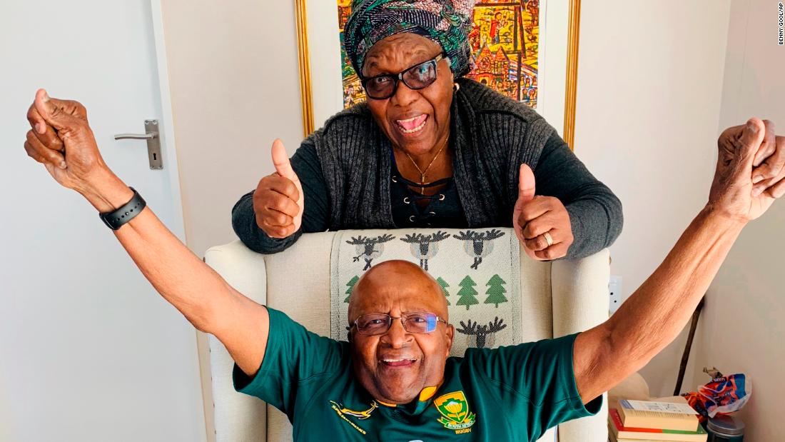 Tutu and his wife, Leah, show their support for South Africa&#39;s rugby team in this photo taken in October 2019. South Africa went on to win the Rugby World Cup.