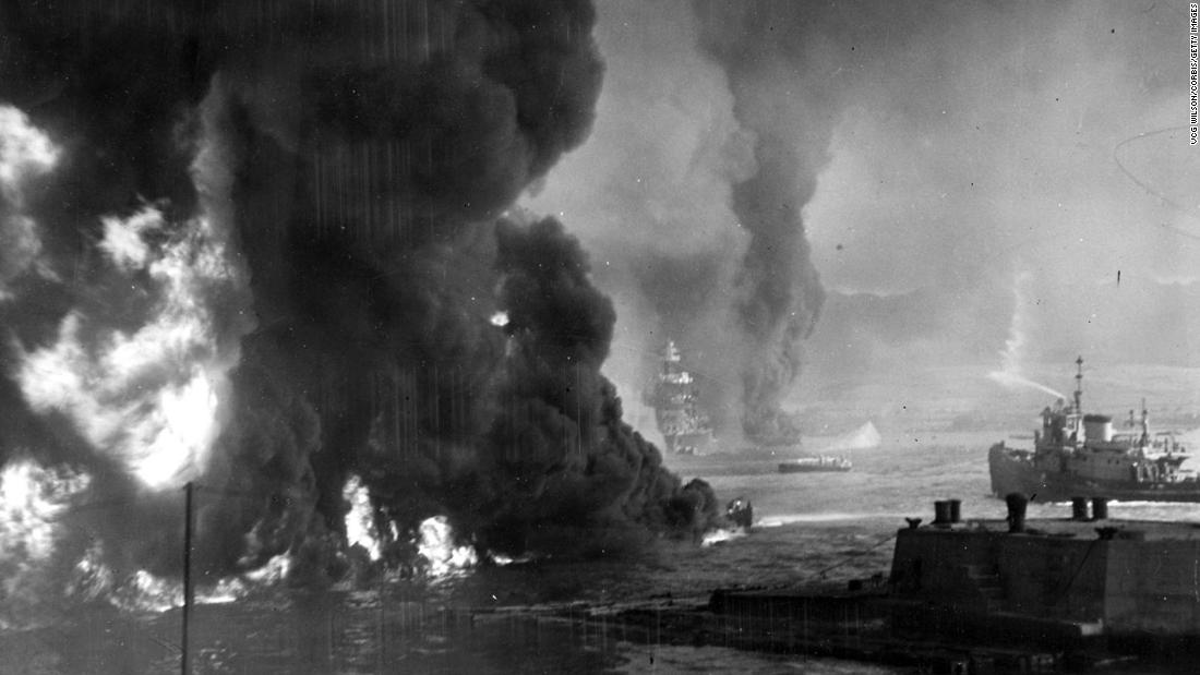 Oil burns on the ocean&#39;s surface near the Naval Air Station.