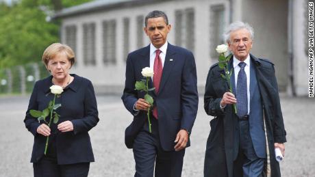  Obama, Merkel and holocaust survior Elie Wiesel pay their respects during a visit to the former Buchenwald concentration camp in 2009.