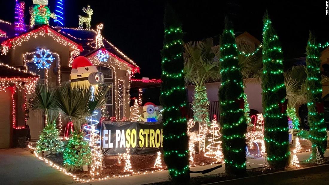 A family is putting up 22 angels on a Christmas display for the El Paso