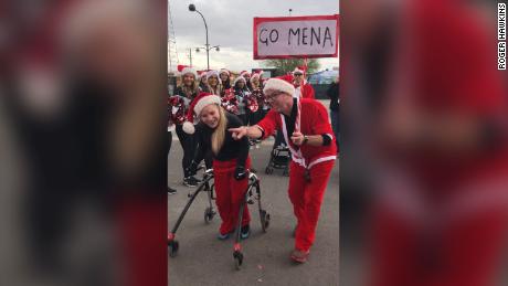 Cerebral palsy couldn&#39;t stop this 17-year-old from finishing the Santa Run using a walker