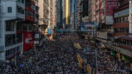 Pro-democracy protesters march in Hong Kong.