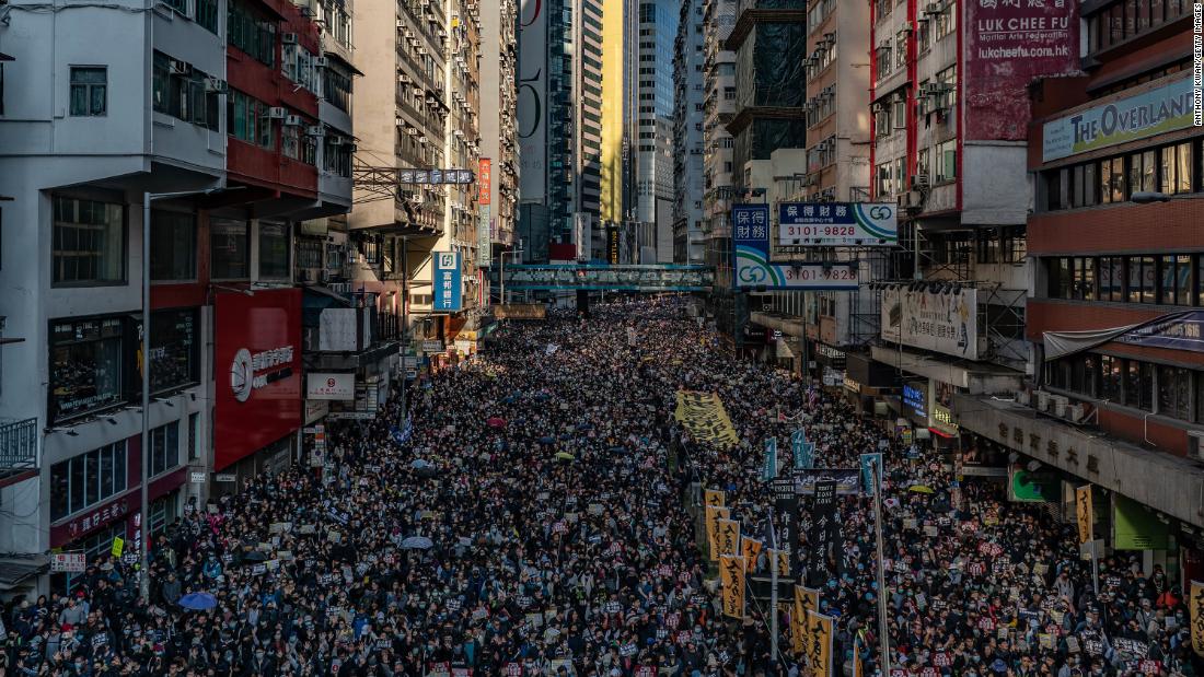 Protesters march in Hong Kong.