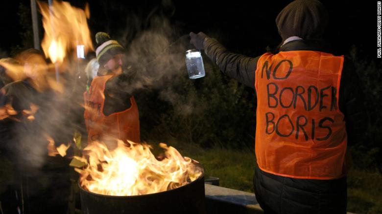 Demonstrators from &#39;Border Communities Against Brexit&#39; attend an anti-Brexit protest at the border between Dundalk, Ireland, and Newry, Northern Ireland.