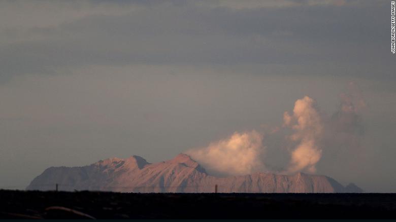 The eruption on White Island is viewed from the Bay of Plenty coastline on December 9.